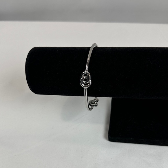 Elegant Silver Tone Knot Bracelet - Picture 2 of 7